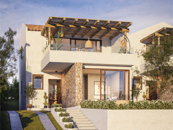 CASA Augusta frontis. Vista panorámica de Casa Augusta en Quintay, con casas aisladas, campo de golf y el mar al fondo.