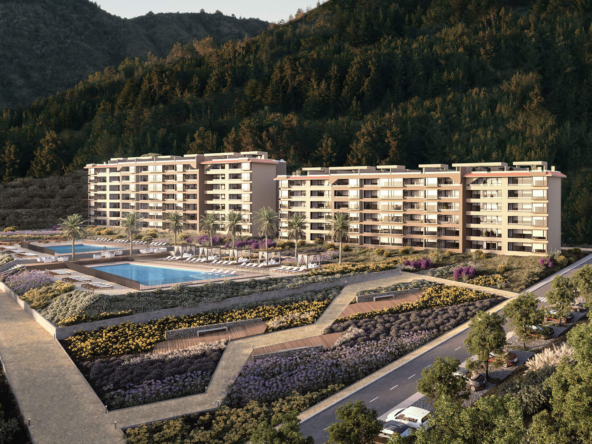 Render de Aires de Quintay con edificios blancos, piscina infinita y bosque que enmarca la vista al océano Pacífico.